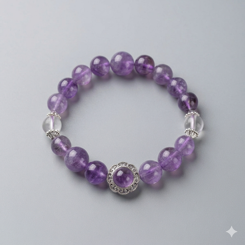 Purple beaded bracelet with a silver clasp on a light gray background
