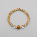 Beaded bracelet with orange and clear beads