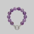 Amethyst statement bracelet with large polished purple gemstone beads and a sparkling pavé interlocking clasp in silver-tone metal