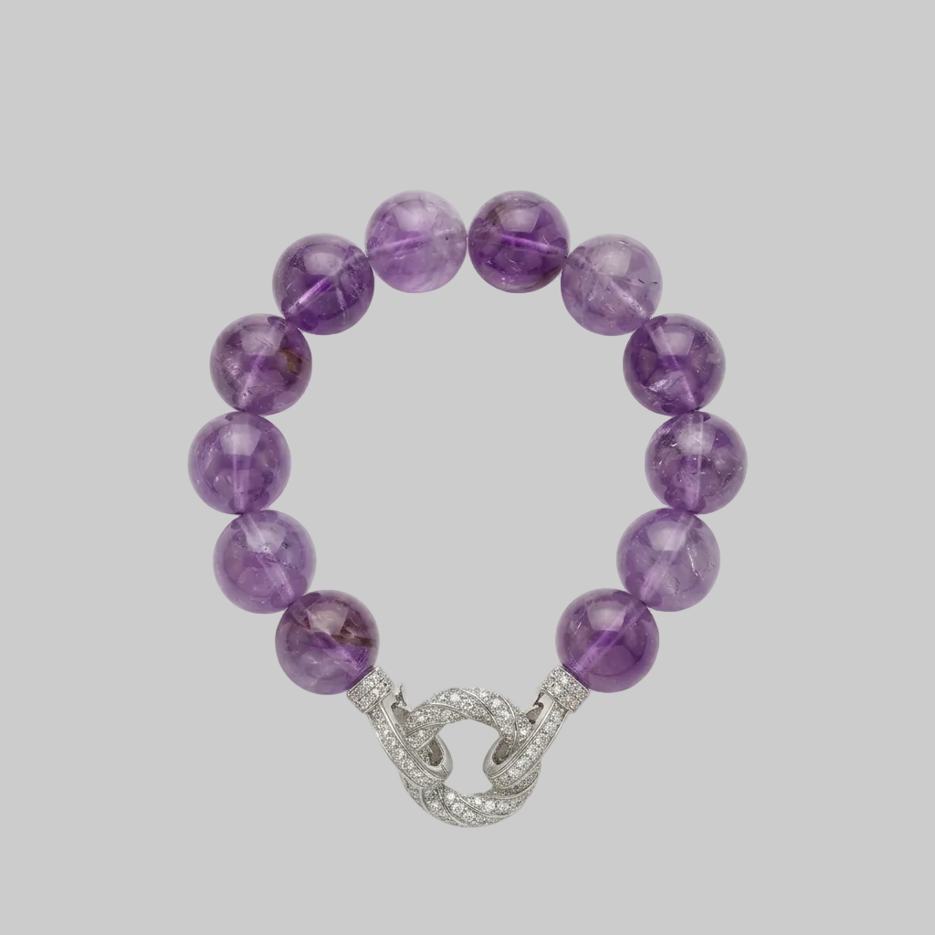 Amethyst statement bracelet with large polished purple gemstone beads and a sparkling pavé interlocking clasp in silver-tone metal