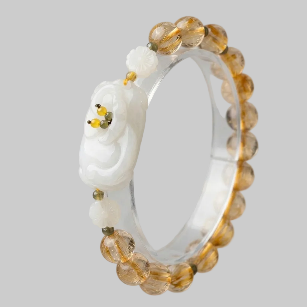 Beaded bracelet with white and brown beads on a gray background